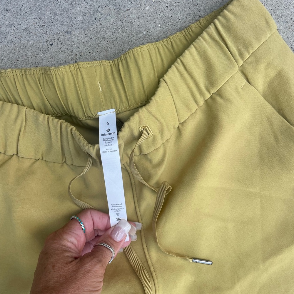 Lululemon, on the fly crop. Size 6, mustard yellow